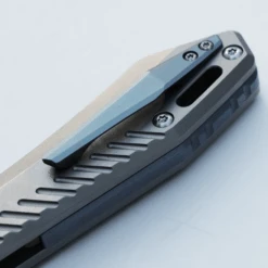 (Sold Out) WMK Exclusive Vosteed RSKAOS Folding Knife Gray Titanium Handle W/ Blue Hardware Elmax Wharncliffe Blade 13 (Sold Out) WMK Exclusive Vosteed RSKAOS Folding Knife Gray Titanium Handle W/ Blue Hardware Elmax Wharncliffe Blade -White Mountain Knives Shop A0905 RSKAOS Elmax Satin Wharncliffe Blade Titanium Handle 7 15933.1699972964