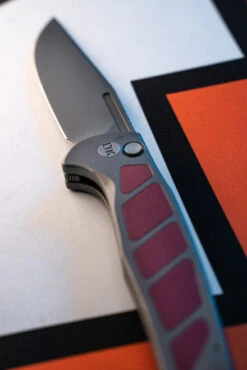 LuvThemKnives Rezult Button Lock, Finger Flicker & Flipper Pocket Knife Titanium Handle Burgundy G10 Inlay 20CV Steel LTK-609-1 -White Mountain Knives Shop DSC0799 45778.1691170665