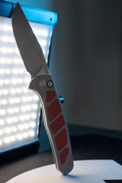 LuvThemKnives Rezult Button Lock, Finger Flicker & Flipper Pocket Knife Titanium Handle Burgundy G10 Inlay 20CV Steel LTK-609-1 -White Mountain Knives Shop DSC0800 33627.1691170665